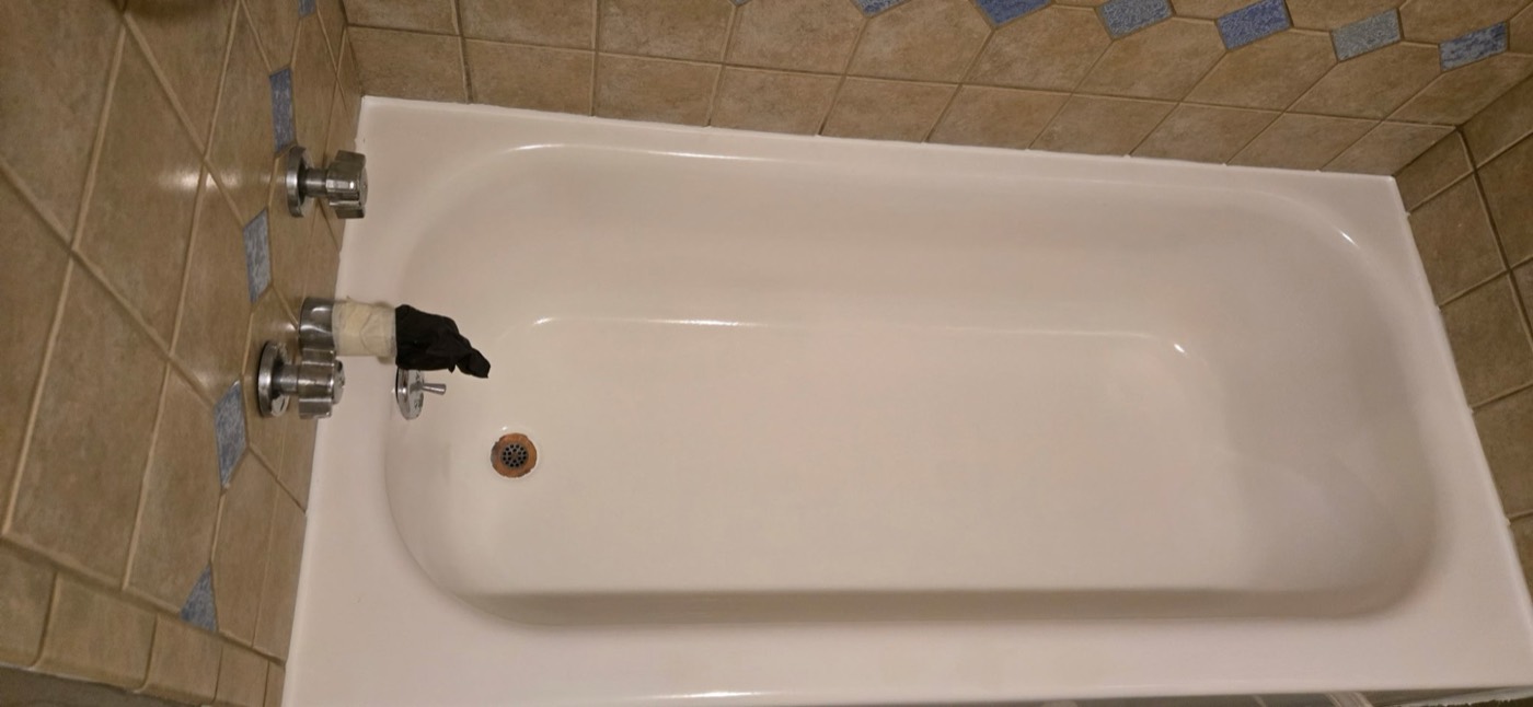 The same bathtub refinished to a bright, glossy white